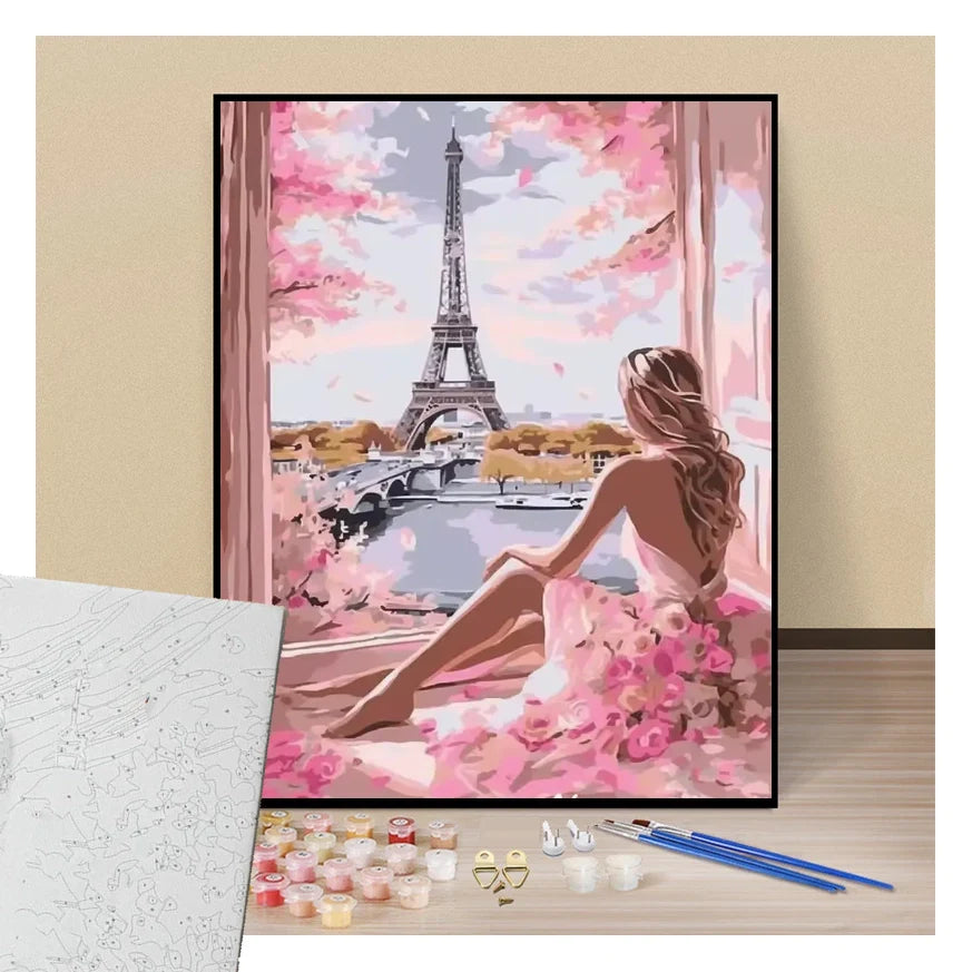Femme en robe rose admirant la Tour Eiffel