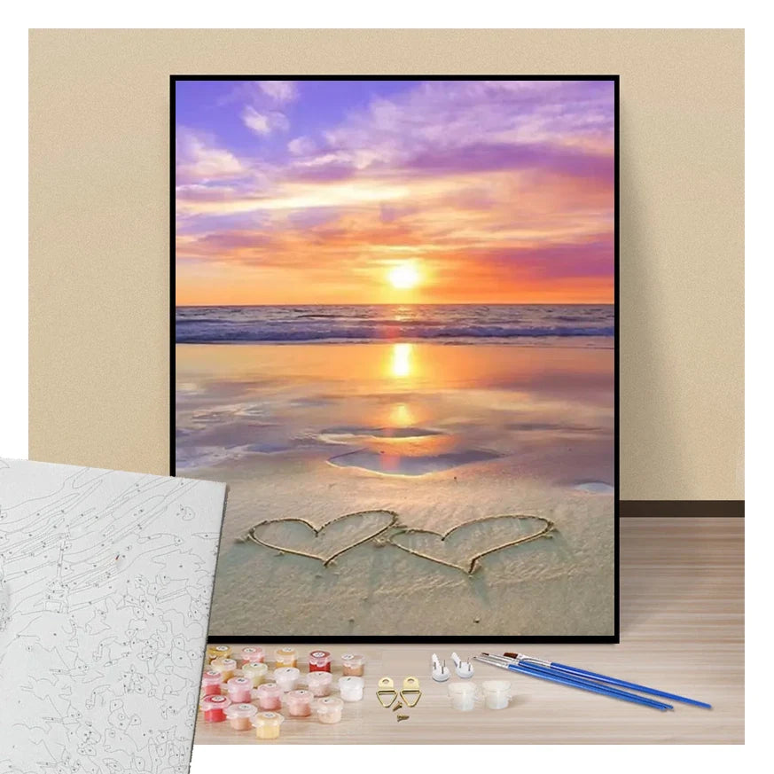 Coucher de soleil des amoureux - coeurs sur le sable
